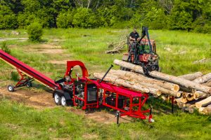 Canadian made firewood processor operating in winter